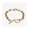 Pulsera de acero de titanio chapado en oro de 14K de alta calidad, popular europea y americana, con cadena de eslabones de personaje japonés, hebilla con forma de O, brazalete de estilo moderno ins B192046