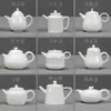 Dehua hecho a mano manteca blanca de jade porcelana Xi Shi tetera olla individual filtro de té blanco puro cerámica logo mayorista formulación