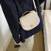 Bolsa de Mão de Luxo Outono Bolsa Sela Feminina 2026 Nova Bolsa Meia-Lua Elegante Portátil de Ombro Transversal Pequena Bolsa Versátil Feminina