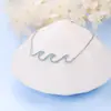 Europa y Estados Unidos más vendidos pulsera de nueva ola para mujer con incrustaciones de diamantes moda todo-partido diseño en forma de ola joyería para la mano suministro transfronterizo