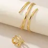 Pulsera Metálica Europea y Americana Transfronteriza al por Mayor Hueca de Tres Capas Enrollada Conjunto de Joyería de Anillo Punk Brillante de Moda Personalizado