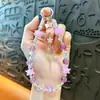 Estilo luxo leve borla borboleta com contas corrente para celular chaveiro moda pingente de bolsa requintado acessórios para capa de celular atacado