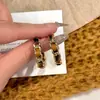 Pendientes de Moda Redondos Trenzados Forma de C Maillard Otoño e Invierno 2026 Nuevo Diseño Retro de Nicho Pendientes de Alta Gama para Mujer
