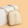 Bolsas pequeñas de moda al por mayor para mujer, nuevo diseño de nicho, adecuadas para salir, bolsa para teléfono, monedero, bolso de hombro y cruzado versátil vintage, moderno