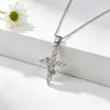Colgante de joyería de collar con cruz de corona giratoria estilo europeo y americano, cobre incrustado con circón, diseño de nicho de lujo ligero para mujer