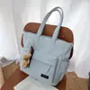 Bolsa de Ombro Pequena de Ursinho Fofo para Menina Mochila Versátil para Estudo no Contraturno e Deslocamento Bolsa Transversal Grande Capacidade Bolsa de Mão Feminina