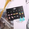 Yiwu fabricantes cross-border brincos conjunto moda feminina bonito metal amor desenho animado frutas borla brincos