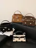 Bolso versátil de moda transfronterizo 2026 verano nuevo nicho bolsa cuadrada pequeña bolso de hombro con un toque de alta gama bolso cruzado
