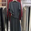 Conjunto de Dos Piezas para Otoño/Invierno 2026: Suéter de Punto Casual Versátil de Color Sólido y Falda Larga Plisada de Cintura Alta para Mujer