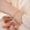 Pulseira com fecho de espiga de trigo em zircônia banhada a ouro 18K real, acessório de pulso único e estiloso para o dia a dia, joia de luxo leve de nicho de alta qualidade