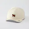 Sombrero de color sólido versátil para bebé con ala suave al por mayor nuevo sombrero solar transpirable para niño pequeño gorra de béisbol linda de cachorro para bebé