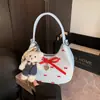 Bolso de Verano Transfronterizo con Lazo Rosa Bajo el Brazo Modelo Nuevo 2026 Bolso Cruzado Estilo Ballet de Gama Alta Bolso Baguette de Moda