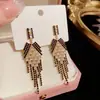 Pendientes Largos Europeos y Americanos Populares Super Brillantes con Borlas Exageradas para Mujer, Modernos, Lujo Ligero, Gama Alta, Tendencia, Exquisitos y Versátiles
