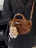Nuevo bolso de un solo hombro para otoño e invierno, con un diseño ligero de felpa, de moda para mujeres en 2026, minimalista, lujoso y único, adecuado para ir al trabajo y se puede llevar como bolso cruzado
