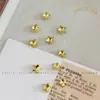 Pedras de strass para manicure douradas, modernas e deslumbrantes, apresentando designs de floco de neve, estrela de cinco pontas e cristal de vidro redondo com base pontiaguda, usadas como acessórios decorativos