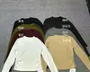 Nueva camiseta interior adelgazante de cuello redondo con patrón de espina de pescado para mujer, top de camiseta de manga larga arrugada de color liso para otoño e invierno