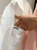 Camisa Larga de Algodón Lavado Única y Súper Elegante para Mujer, Nuevo Diseño Popular Primavera 2026 con Abertura Trasera Top Chaqueta