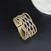 Nuevo diseño de pulsera de alambre abierta elástica con cruz de ocho filas tachonada de diamantes, personalizada, 2 mm, strass, venta al por mayor B347