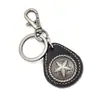 Nueva moda regalos creativos personalidad para hombre colgante de estrella de cinco puntas llavero de piel de vaca llavero de cintura punk
