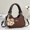 Bolso de mano tipo bolsa de dumplings nuevo y elegante de alta apariencia, bolso de hombro o axila versión coreana, bolso cruzado para mujer, bolso para mujer