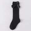 Meias Infantis Novas da Primavera de 2026 Meninas Meia-Calça de Cor Sólida Listrada com Punho Bolha Meia de Algodão com Laço para Bebê Meias de Princesa