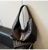 Bolsa feminina de grande capacidade transfronteiriça 2026 nova vintage versátil de ombro para compras bolsa tote simples casual para o dia a dia