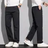 Calças casuais, corte reto slim, versáteis para o dia a dia e trabalho masculino, elásticas, calças compridas masculinas que valorizam a altura, calças masculinas da moda para o outono no atacado