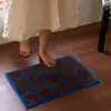 Venta al por mayor de alfombras de moda, de bloques de color, a cuadros y flocadas para exportación, con tufting de alta densidad, tapetes de baño absorbentes y tapetes de entrada antideslizantes