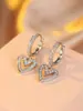 Paño de deseos transfronterizo paño espiritual hueco hermoso amor hebilla de oreja simple pendientes exquisitos pendientes pequeños versátiles hebilla de oreja