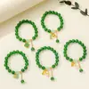 [Venta al por mayor directa de fábrica] Nuevo estilo chino Imitación Jade Dongling Puesto de Exhibición de Feria de Templo del Mercado Nocturno Pulsera de Vidrio Joyería Más Vendido