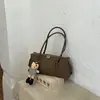 Bolso de axila retro minimalista francés transfronterizo para mujer, nuevo modelo 2026, estilo nicho con sensación de alta gama, bolso de mano de un solo hombro