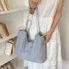 Bolso de mujer grande, simple y casual, nuevo bolso tote de moda de nicho estilo coreano transfronterizo, bolso de hombro y axila de lona