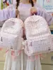 Mochila estampada elegante transfronteriza 2026 para estudiantes universitarias, mochila escolar fresca y simple para estudiantes de secundaria, mochila ligera