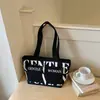 Bolsa de lona com estampa de letras e múltiplos bolsos, novo modelo 2026, bolsa de mão de alta qualidade, sacola de compras, bolsa de ombro, bolsa de mão para o dia a dia