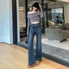 Foto real calça jeans feminina flare cintura alta retrô 2026 primavera e outono novo cintura alta justa solta versátil calça micro flare