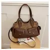 Comercio exterior diseño minimalista europeo y americano retro transfronterizo color block 2026 empalmado moderno bolso cruzado tote bandolera para mujer