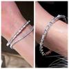 Pulsera de hueso de serpiente con forma de serpiente de fritilaria de lujo ligero, pulsera con textura de diamante brillante, temperamento de alta gama, pulsera abierta ajustable