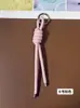 Llavero de cordón de cuero PU transfronterizo, colgante versátil para bolso, accesorios de decoración para botellas de agua y muñecas DIY, llaveros al por mayor