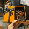 Miu Anillo de Llavero de Pan con Agua Alcalina Resina Pan Colgante de Llavero de Bolsa de Chocolate Regalo de Graduación
