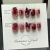 [Armadura usada a mano] Uñas postizas de mariposa con camelia roja vino de las Spice Girls Parches de armadura usados a mano La manicura es blanca