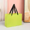 Bolsas de Papel en Stock para Tiendas de Ropa, Bolsos de Mano de Alta Gama Estilo Ins, Bolsas de Regalo para el Día del Niño, Bolsas de Papel Cartulina Blanca con Logo Personalizado