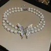 Collar de Cadena para el Cuello de Mariposa de Perlas de Doble Capa Francés Moda Estilo de Entrada de Lujo Cadena para la Clavícula Collar Nuevo Joyería para Mujer Sentido de Alta Gama