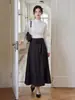 Falda de traje para mujer Feiyuan, elegante y estilosa, estilo casual de negocios para ir al trabajo, nueva falda de línea A versátil de color liso para otoño e invierno