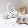 Bolsa de bolinhas 2026 bolsa feminina de nicho novo estilo moderna mini bolsa tiracolo simples bolsa de mão casual bolsa cilíndrica redonda