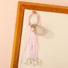Nuevo Bolso Colgante de Bola de la Suerte Tejido a Mano Bolso Colgante Encanto Tendencia Nacional Nicho Borla Llavero de Pareja Colgante Venta al por Mayor