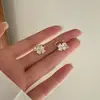 Clip de hueso de oreja de flor de circón para mujer sin perforar pendientes de alta calidad diseño elegante simple estilo frío pendientes de diseño personalizado