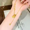 Mismo estilo que la tienda de oro, collar con borla de corazón cepillado en oro arena para mujer, cadena para la clavícula versátil simple de nicho de lujo ligero de alta gama