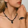 Moda Europea y Americana Verde Azul Rojo Pedrería Conjunto de Collar Pendientes Pulsera Anillo Amazon Estilo Caliente Cuatro Piezas Completamente de Diamante