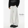 Pantalones casuales de punto elástico con estampado de camuflaje y letras de estilo americano de alta calle para hombre y mujer, pantalones largos holgados de pierna ancha