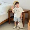 Conjunto de dos piezas de verano fino para bebé, shorts sin costuras de manga corta con dibujos animados para niños pequeños, venta directa del fabricante